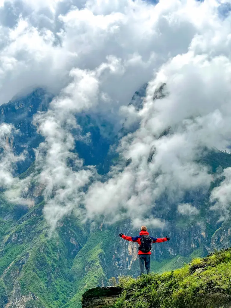 Tourists taking selfies at Tiger Leaping Gorge in Yunnan, China