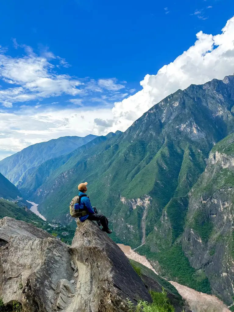 Tourists taking selfies at Tiger Leaping Gorge in Yunnan, China