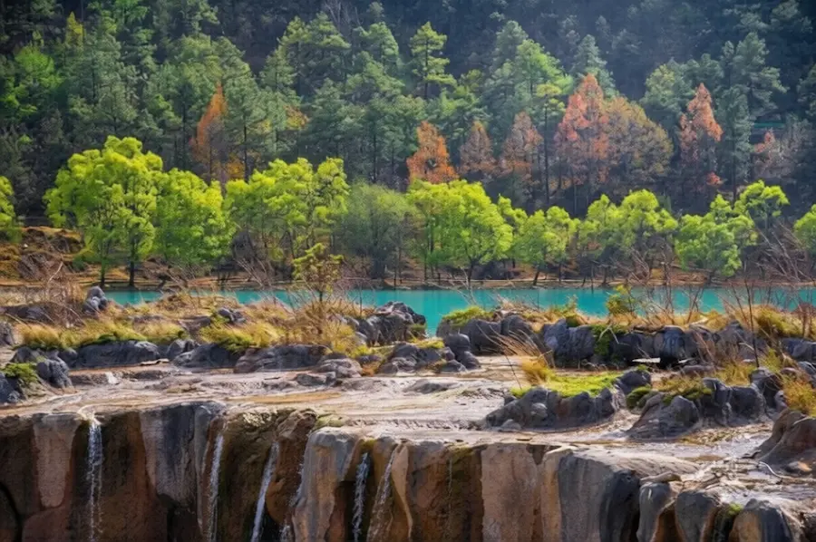 Blue water and cascades in Blue Moon Valley, Yunnan, China