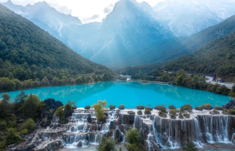 Blue Moon Valley Below Jade Dragon Snow Mountain China:Tiered waterfalls at Blue Moon Valley, Jade Dragon Snow Mountain