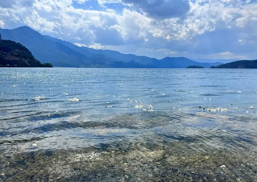 Best Month to Visit Yunnan:Water splashes at Lugu Lake in Yunnan