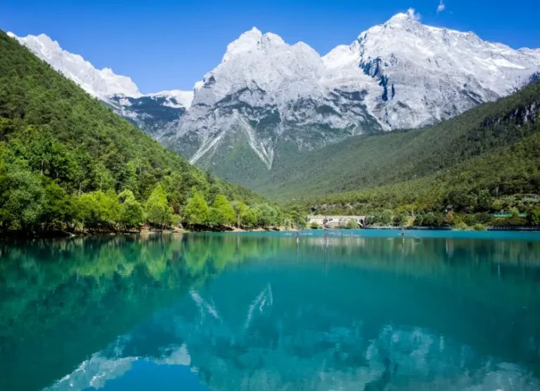 Turquoise lake at Blue Moon Valley with Jade Dragon Snow Mountain backdrop